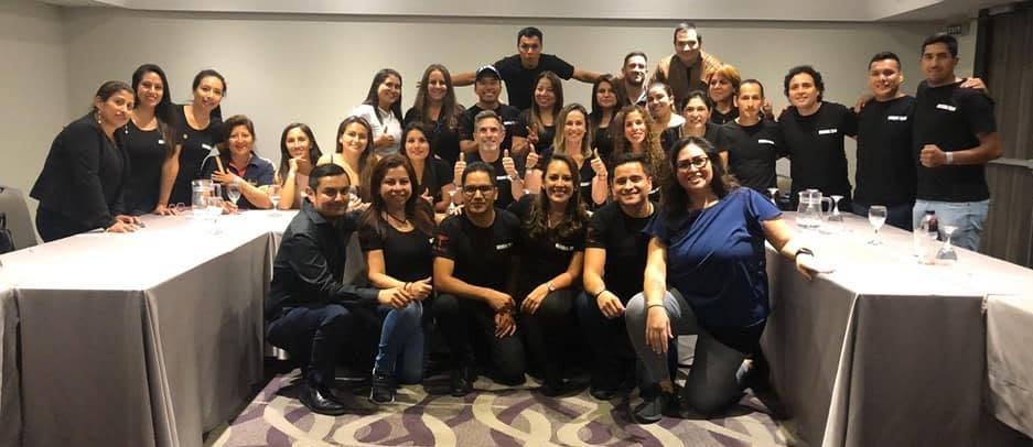 Yaya with a corporate training team in Peru.