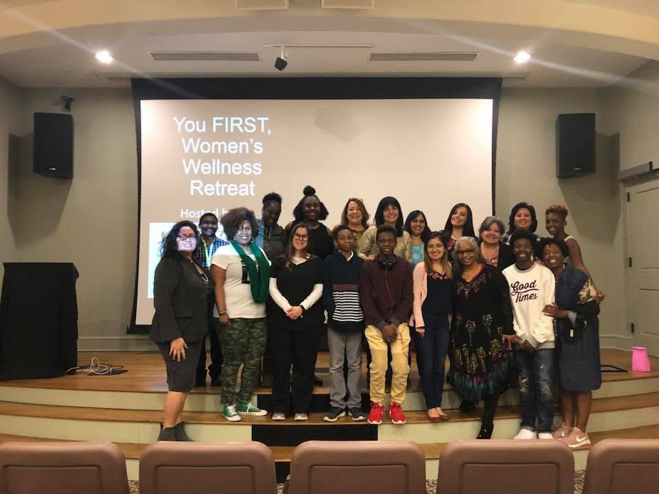 Yaya with students and staff at a Salem College women&rsquo;s wellness retreat.